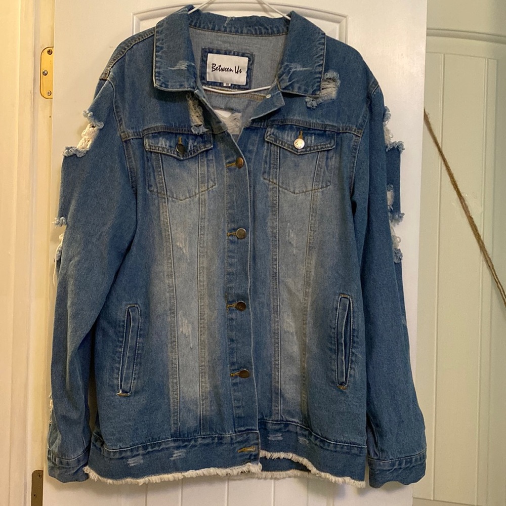 Medium washed long distressed jean jacket